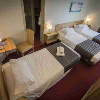 Hôtel Le Castel Fleuri Rooms