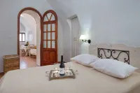 코코스 트래디셔널 하우시스