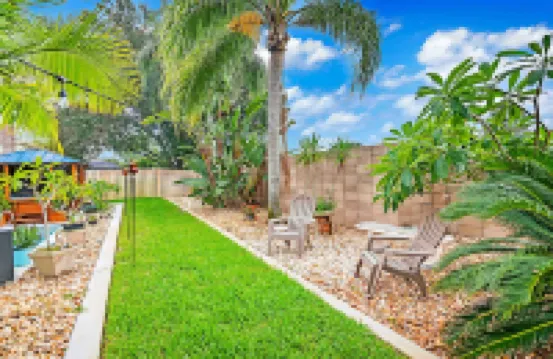Urban Oasis W/Hot Tub, Heated Pool and Private Movie Theater 2 Bedroom Home by RedAwning