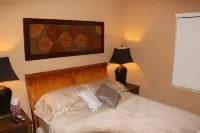 Tropical Bliss: Private Heated Pool, Steps from the Drive, Minutes to the Beach!