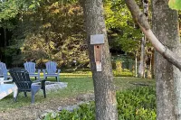 Panoramic Views of Miller Lake - The Lookout perched on the waters edge. Hotels near Emmett Lake Day Use Area