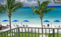 Gorgeous Ocean Views!! In the Center of 7 Mile Beach!! Walk to Most Everything!