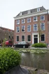 Canal house top floor in historic center Gouda