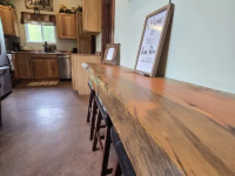 Themed Bear's Den Cabin__nestled in the pines minutes outside of Glacier Park. Hotels in Coram