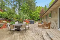 Ideal Lakeshore location in serene wooded landscape with waterfalls.