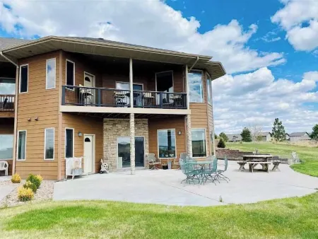 Large Bayside Golf Course home with Lake Views.