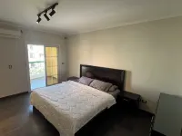 Sunny Elegant apartment in wonderful New Cairo Near AUC with WiFi, AC Hotels in El Matareya