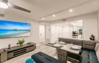 Vanderbilt Beach Condo, Bay Views, New Saltwater Pool, Walk to Beach