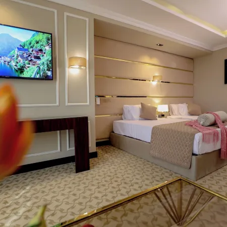Cairo Taj Mohandessn Hotels & Suites Отели рядом с достопримечательностью «Докки»
