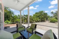 Waterfront Pink House with Private Dock & Pool - 4-Star