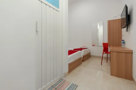 RedDoorz @ Graha Cemerlang Maros Отели в г. Marusu