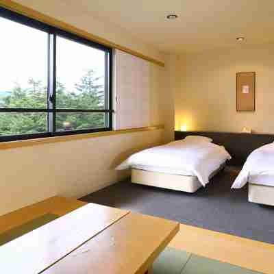 万座温泉 日進舘 Rooms