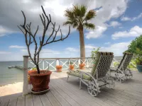 La Petit Maison, is a waterfront two-story cottage near Kemah,TX Hotels in Bacliff