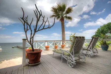 La Petit Maison, is a waterfront two-story cottage near Kemah,TX