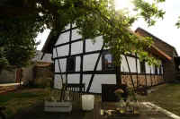 Complete house-family-friendly-rural idyll-ecological. renovated mud house / thatched roof Hotels in Bossdorf