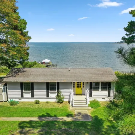 The Beach Retreat is a cozy beach Villa with Hottub overlooking a private beach.