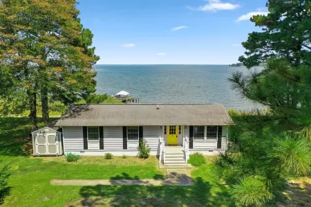 The Beach Retreat is a cozy beach Villa with Hottub overlooking a private beach.