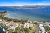 Exceptional modern three bedroom townhouse with water on both sides.