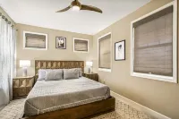 4 bedroom/ 3 bath luxury home with A/C, steps to community pool, oceanview