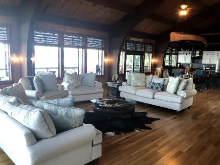 WELCOME TO ON THE ROCK - A RECENTLY RENOVATED  BEAUTIFUL LAKE FRONT HOME