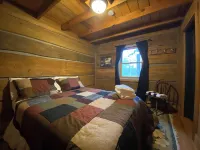 40 Acre Wooded Retreat on Columbus Lake with 1300 feet of shoreline.