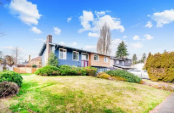 Spacious remodeled home with central AC and fenced yard