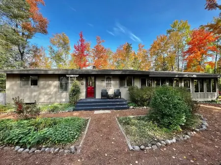 Hot Tub in the Forest Cozy Home on Peaceful Lake