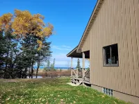 Waterfront house w/ large garage located on trail 8 in Grand Marais.