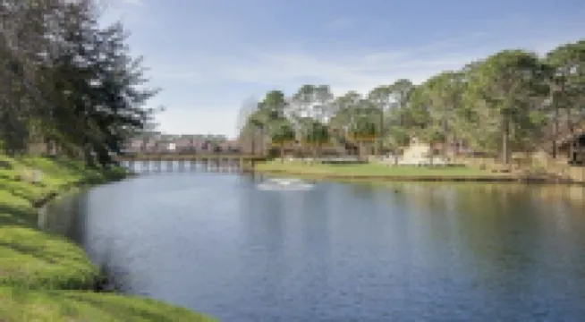 Newly Renovated! Idyllic Lake Views, Golf Cart Included, Beach Close By!