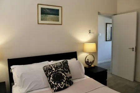 Nestled in the Heart of Fitts Village, Zinnia Becons with the Promise of a Costa