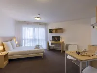 Kosy Appart'Hotels Troyes City & Park Hôtels à proximité de : Centre de Congrès de l'Aube