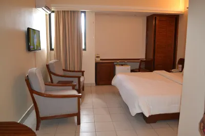 Planet Hotel Hotels near Douala General Hospital.