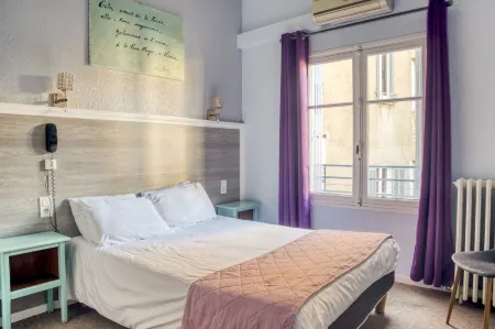 Citotel Hôtel Cesar Отели рядом с достопримечательностью «Карре д'Ар»