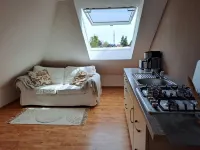 Quiet and centrally located apartment on the top floor of an old villa