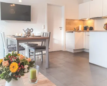 Modern, spacious, comfort apartment on the ground floor for four people and a baby. Hotels in Greetsiel