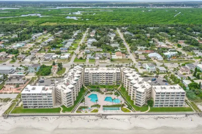 Oceanfront condo with balcony, WiFi, W/D, 2 pools, beach access & shuffleboard Hotels near Wild Side Clothing