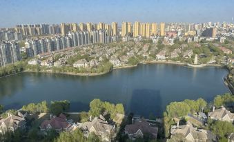 Yuerong Bay Jieyouzhan Serviced Apartment (Central Academy High School Mingrun Plaza Yanshun Road)