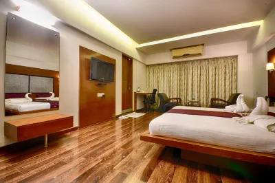 白金居留飯店 Rai University Ahmedabad Gujarat附近的飯店