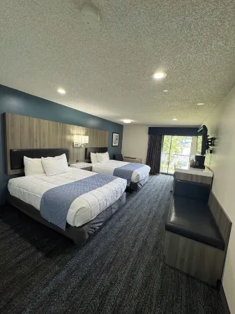 Oyster Bay Inn & Suites Отели в г. Парквуд