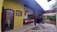 Casa Elegante Piscina Area Gourmet Hôtels à : Itanhaém