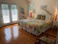 "The Palms" is nestled on a secluded half acre in the forest.  ThePalmsHouse.com