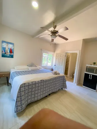 Suite#2 Room walking distance to West Bay Beach