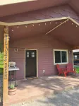 Themed Bear's Den Cabin__nestled in the pines minutes outside of Glacier Park.