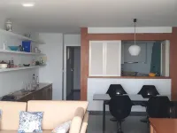 Apartment in front of the beach and with free parking in the same building.