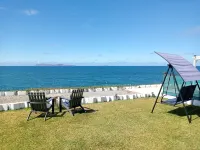 Estudio privado con fogata y vista al mar