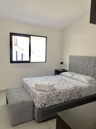 Exclusive Gated Community with HD TV, Air Conditioning, Cable and Netflix Отели в г. Антигуо Кускатлан