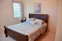 Spectacular home - 5 mins walk to beach, modern, comfortable, clean and spacious Hotels near Rendezvous Bay Beach