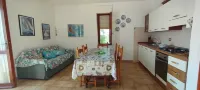 Family apartment facing the Gulf of Asinara Hotels in Stintino