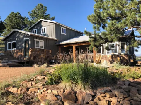Mountain house overlooking Bear Basin Valley and the Sangre de Cristo Range.