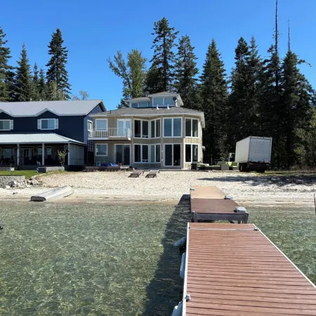 Priest Lake Waterfront Property With Majestic Lake & Mountain Views.